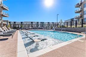 our apartments have a resort style pool with lounge chairs