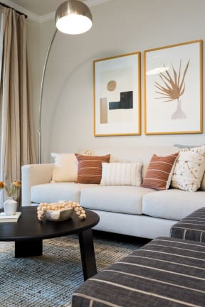 a living room with a couch and a coffee table