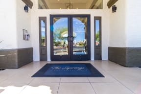 a welcome mat in front of a door