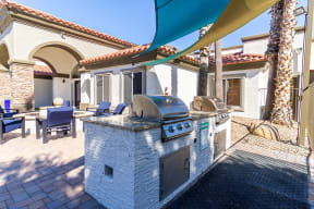 a bbq grill is available at the enclave at woodbridge apartments in sugar land,