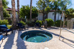 our hot tub is located in the backyard of our apartments