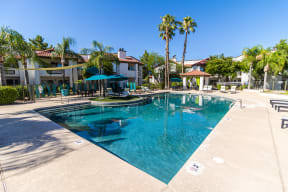 the resort style pool at the enclave at woodbridge apartments in sugar land, tx