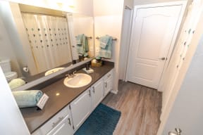 this is a photo of the bathroom of a 1 bedroom apartment at deer hill apartments in c