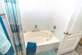 this is a photo of the bathroom in a 1 bedroom apartment at deer hill apartments in c
