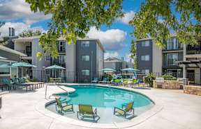 Pool With Relaxing Chairs at Terra Vista at the Park Apartments, Colorado, 80123