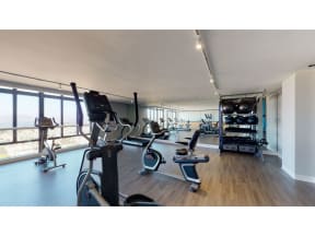 a room filled with lots of different types of exercise equipment
