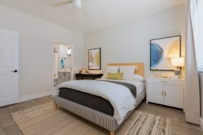 a bedroom with a bed and a closet