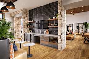 Clubhouse with a kitchentte at Firestone Junction apartments in Firestone, CO