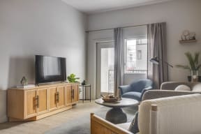 a living room with a couch and a tv