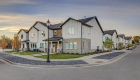 new homes on the corner of a street in a subdivision