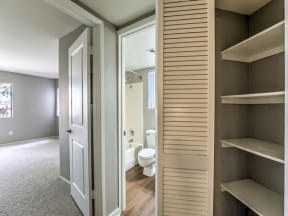 Apartment Hall closet, bathroom and bedroom view