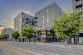 a photo of a building on the corner of a city street