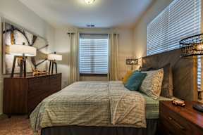 Model of one of The Everlin at Indian Trail furnished bedrooms showcasing Indian Trail apartments for rent.