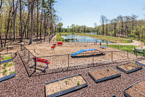 Fenced dog park with agility equipment at The Everlin at Indian Trail apartments in Indian Trail, NC.