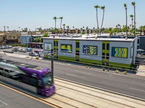 a bus on a street in front of a building