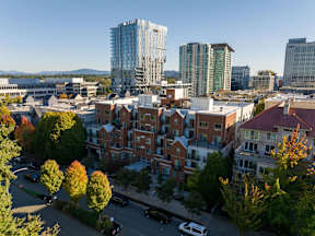 A cityscape with a mix of modern and traditional buildings.