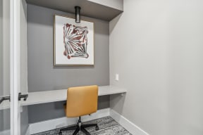 a workspace with a desk and a chair in a home office