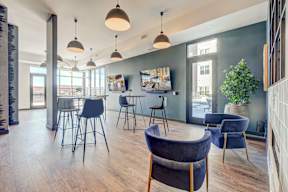 Clubhouse with TVs and bartop tables  at Novus, Lone Tree