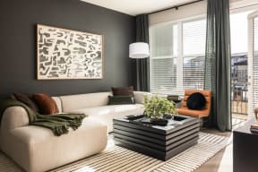 a living room with a couch and a coffee table