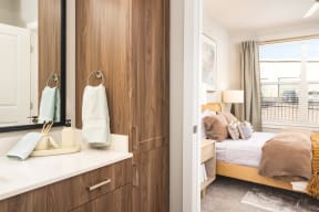 Bathroom with view to bedroom and ample storage