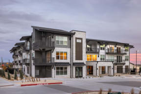 an image of an apartment building on a city street
