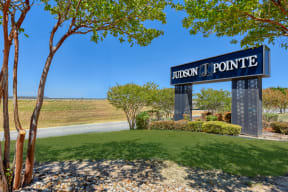 a view of the sign at the entrance to the lubbock pointe apartments
