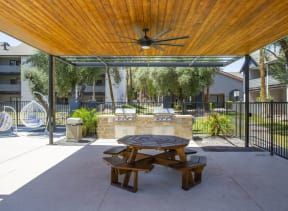 Patio with a Picnic Table at The Julia Apartments, Mesa, 85210