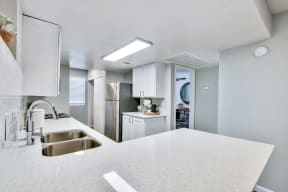 Kitchen with White Countertop at The Julia Apartments, Arizona, 85210