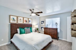 Bedroom with a Large Bed at The Julia Apartments, Mesa, AZ