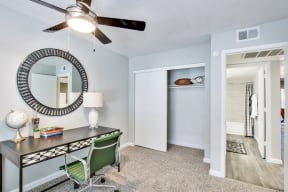 Bedroom with a Desk at The Julia Apartments, Mesa