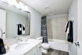 Bathroom with a White Sink at The Julia Apartments, Arizona