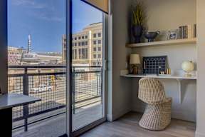 A modern room with a chair and a desk.