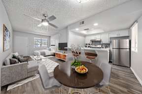 Dining table and chairs at Newport Avondale apartments for rent.