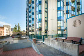 a view of a building with a fountain in front of it
