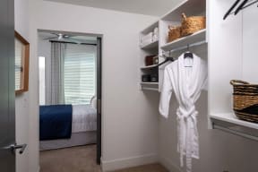 a bedroom with a closet and a bed in it