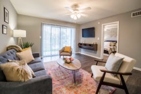 a living room with a couch and a table