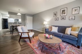 a living room with a couch and a table