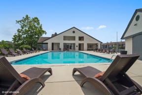 our apartments have a large pool and lounge chairs