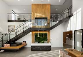 Staircase in the middle of living room at Alta Davis, Durham