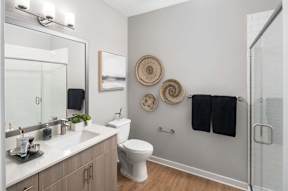 Bathroom with mirror and sink at Alta Davis, Durham, North Carolina