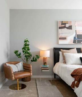 Bedroom with bed and chair at Alta Davis, North Carolina