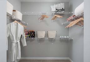 Walk-in closet with drying rack and towels at Alta Davis, Durham, NC
