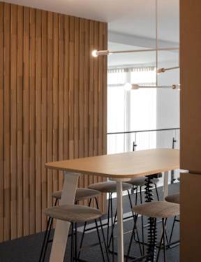 Dining room with wooden table at Alta Davis, Durham, 27703