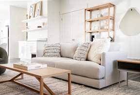 a living room with a couch and a coffee table