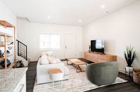 a living room with a couch and a tv