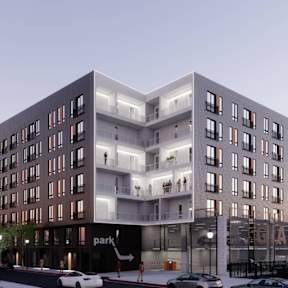 a rendering of an apartment building on a city street