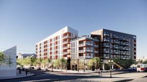 a rendering of an apartment building on a city street