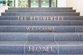 a set of stairs with gold lettering on the steps of a building at 1700 California Street, San Francisco, CA, 94109