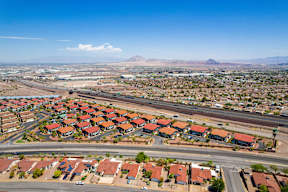 A suburban neighborhood with houses and streets.