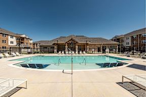 Resort-style pool with lounge chairs at Brandywine Green, Maryland